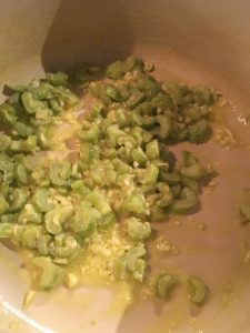 celery and garlic in Dutch oven after sautéing