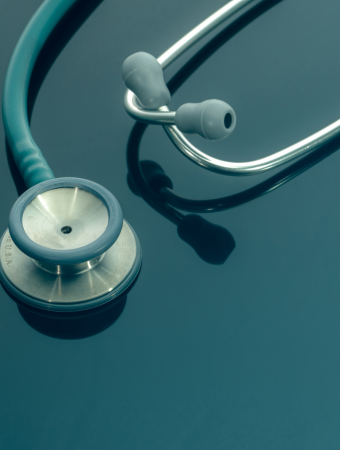 Blue background with physician stethoscope